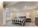 Cozy bedroom featuring a patterned quilt, modern nightstands, and neutral walls for a relaxing retreat at 2539 Lake Meadow Dr, Lafayette, CO 80026