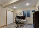 Cozy home office with natural light from the window, ample storage, and modern desk setup at 2539 Lake Meadow Dr, Lafayette, CO 80026