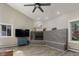 A cozy living room with modern gas fireplace and light-colored flooring at 2539 Lake Meadow Dr, Lafayette, CO 80026