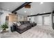 Large gray sectional sofa in the basement living room at 902 Jarvis Dr, Erie, CO 80516