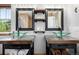 This bathroom features dual sinks with glass basins and granite countertops at 902 Jarvis Dr, Erie, CO 80516