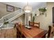 Dining room featuring a rustic wood table and light fixture with hardwood floors at 902 Jarvis Dr, Erie, CO 80516