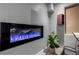 Close up of a modern electric fireplace in the basement living room at 902 Jarvis Dr, Erie, CO 80516
