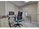 Well-lit office with modern desk, comfortable chair, and room for storage at 3766 S Nelson Way, Denver, CO 80235