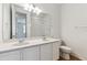 Bathroom with double vanity and a mirror at 4519 Boone Cir, Brighton, CO 80601