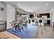 Modern kitchen with an island, stainless steel appliances, and an adjacent dining area at 857 Gold Hill Dr, Erie, CO 80516