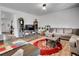 Spacious living area with modern decor, plush seating, and ample space for entertaining at 857 Gold Hill Dr, Erie, CO 80516