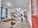 Inviting living room with plenty of natural light and a view of the staircase at 857 Gold Hill Dr, Erie, CO 80516