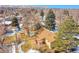 Aerial view of home featuring a spacious backyard with mature trees and a large deck, perfect for outdoor living at 12286 W Tennessee Ave, Lakewood, CO 80228