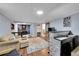 Relaxing finished basement featuring a bar, lounge area, and decorative dart board at 12286 W Tennessee Ave, Lakewood, CO 80228