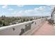 Spacious balcony boasts panoramic city views and outdoor seating for relaxation and entertainment at 1029 E 8Th Ave # 901, Denver, CO 80218