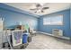 Functional bedroom features hard flooring, a large window, and plenty of natural light at 1029 E 8Th Ave # 901, Denver, CO 80218