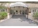 Park Place Tower entryway with covered awning, stairs and access to building entrance at 1029 E 8Th Ave # 901, Denver, CO 80218