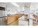 Kitchenette features ample counter space, light wood cabinets, and stainless-steel appliances at 1029 E 8Th Ave # 901, Denver, CO 80218