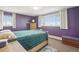 Comfortable primary bedroom with carpet floors, large windows, and ample natural light at 1029 E 8Th Ave # 901, Denver, CO 80218