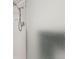This shower features a sleek shower head and frosted glass sliding door at 1029 E 8Th Ave # 901, Denver, CO 80218