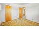 Cozy bedroom features neutral walls, two closets, and carpeted flooring at 245 S 13Th Ave, Brighton, CO 80601