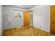 This bedroom features a large window and door leading outside at 245 S 13Th Ave, Brighton, CO 80601