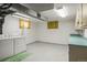 Basement laundry room with washer, dryer, and storage cabinets at 245 S 13Th Ave, Brighton, CO 80601