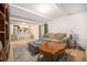 Bright living room with wood floors, comfortable seating, and an open layout leading to the kitchen at 12289 W Atlantic Ave, Lakewood, CO 80228