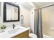 Bathroom with a shower and a sink with a black faucet and mirror at 18302 E Kepner Pl # 207, Aurora, CO 80017