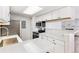 Bright kitchen with stainless steel appliances and light countertops at 18302 E Kepner Pl # 207, Aurora, CO 80017