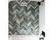 Modern shower with blue and gray herringbone tile at 1219 Cherry St, Denver, CO 80220