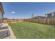 Well-maintained backyard featuring a lush lawn and a wooden privacy fence at 13460 Broad Wing Ave, Parker, CO 80134
