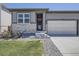 Charming single-Gathering home featuring a two-car garage, manicured lawn, and inviting front entrance at 13460 Broad Wing Ave, Parker, CO 80134