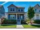 Two-story craftsman home with welcoming front porch at 8668 E 54Th Pl, Denver, CO 80238