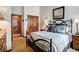 Bedroom features a comfortable bed, closet, and rustic wood accents at 680 S Main St # 18, Breckenridge, CO 80424