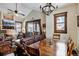 Large dining table adjacent to the living room and fireplace, perfect for gatherings at 680 S Main St # 18, Breckenridge, CO 80424