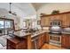 Well-equipped kitchen with granite countertops open to dining area at 680 S Main St # 18, Breckenridge, CO 80424