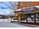 Christy Sports storefront with winter landscape and mountain views at 680 S Main St # 18, Breckenridge, CO 80424