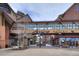 Vibrant pedestrian area featuring unique shops, a skybridge, and inviting street decor for a lively experience at 680 S Main St # 18, Breckenridge, CO 80424