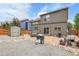 Spacious backyard with patio, shed, outdoor seating and privacy fence at 10540 Tracewood Cir, Highlands Ranch, CO 80130