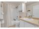 Clean bathroom featuring shower-tub combo and vanity with plenty of storage space at 10540 Tracewood Cir, Highlands Ranch, CO 80130