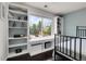 Cozy bedroom featuring a window seat with storage and shelves, ideal for relaxing at 10540 Tracewood Cir, Highlands Ranch, CO 80130