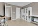 Spacious office with tile flooring, built-in shelving, and easy access to other rooms at 10540 Tracewood Cir, Highlands Ranch, CO 80130