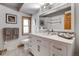 Stylish bathroom featuring a modern vanity, elegant fixtures, and a large mirror for a spa-like experience at 4901 W 103Rd Cir, Westminster, CO 80031