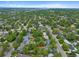 Aerial view showing the property's location with mature trees, conveniently near the city at 6283 S Prescott St, Littleton, CO 80120