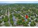 Real estate aerial view with surrounding neighborhood, highlighting mature trees and serene setting at 6283 S Prescott St, Littleton, CO 80120