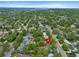 Aerial view showing the property's location with mature trees, conveniently near the city at 6283 S Prescott St, Littleton, CO 80120