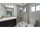 Modern bathroom with a sleek vanity, a glass-enclosed shower, and stylish tile work for a contemporary look at 6283 S Prescott St, Littleton, CO 80120