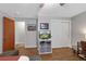 This bedroom has hardwood floors, gray walls, and a large closet at 6283 S Prescott St, Littleton, CO 80120