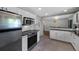 Spacious kitchen featuring stainless steel appliances and a sleek design at 6283 S Prescott St, Littleton, CO 80120