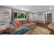 Bright living room with hardwood floors, a comfortable couch, and lots of natural light at 6283 S Prescott St, Littleton, CO 80120