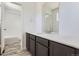 Bathroom with tiled floor and modern vanity at 683 N Deer Park St, Watkins, CO 80137