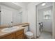 Bathroom with a sink, toilet, and in-unit laundry machines at 1623 E 164Th Pl, Brighton, CO 80602