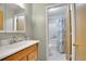 Clean bathroom with a shower and a bathtub at 23317 E Saratoga Cir, Aurora, CO 80016